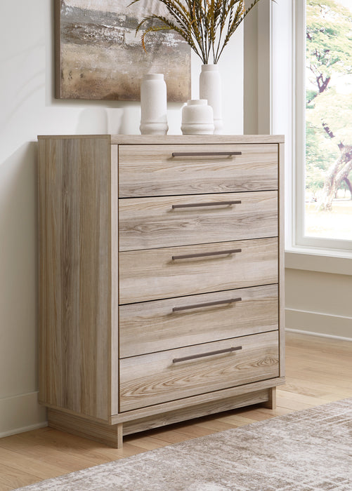 Hasbrick Tan Wide Chest of Drawers