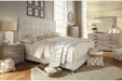 Dolante Beige Queen Upholstered Bed - B130-581 - Lara Furniture