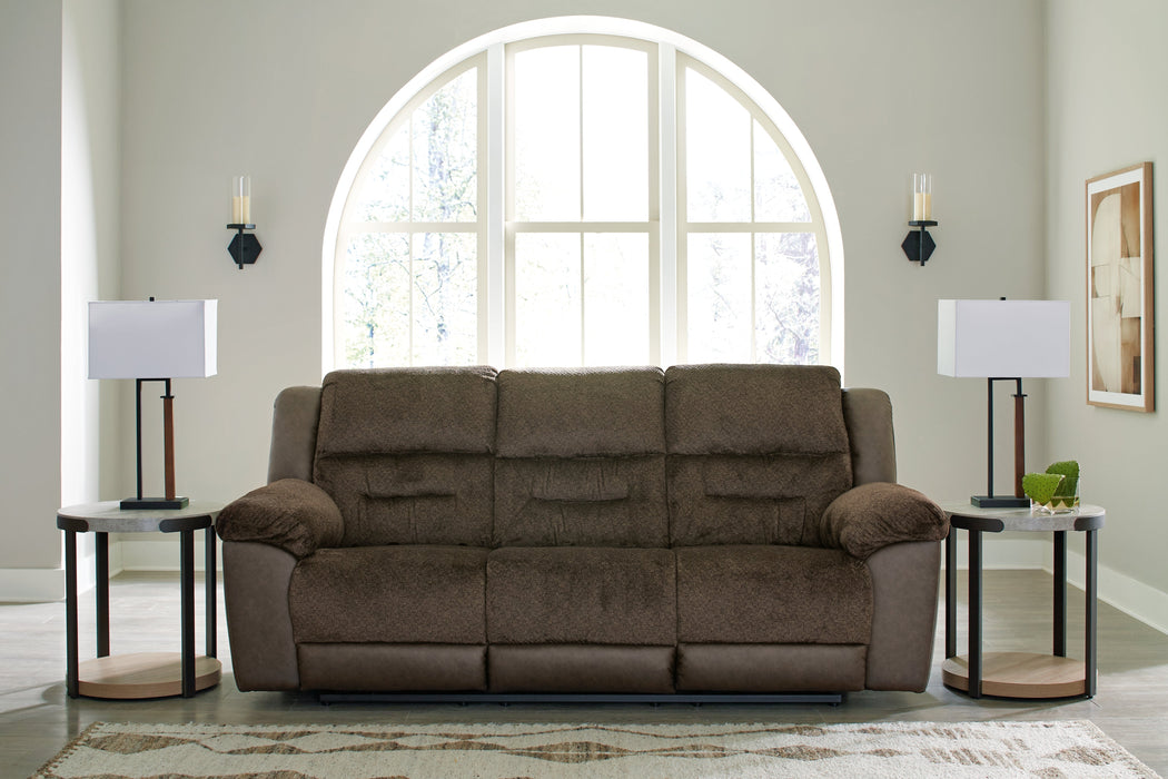 Dorman Chocolate Reclining Sofa - 9460888