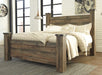 Trinell Brown King Poster Bed - Lara Furniture