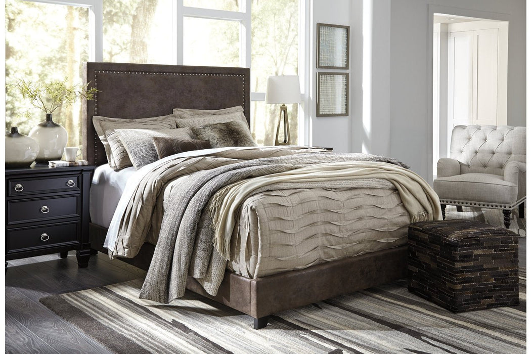 Dolante Brown King Upholstered Bed - Lara Furniture