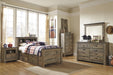 Trinell Brown Panel Bookcase Under Bed Storage Youth Bedroom Set - Lara Furniture