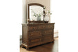 Flynnter Medium Brown Dresser - Lara Furniture