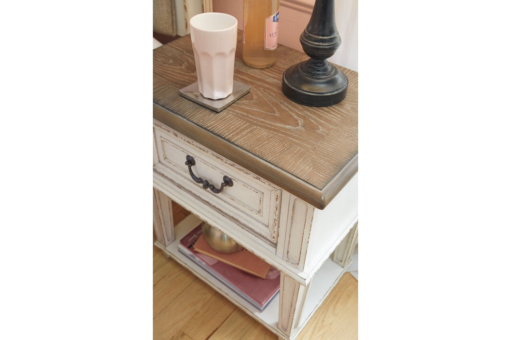 Realyn Chipped White Nightstand - Lara Furniture