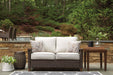 Paradise Trail Medium Brown Loveseat with Cushion - Lara Furniture