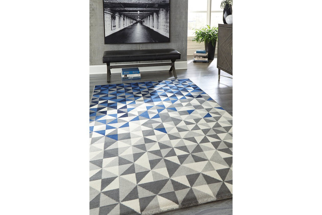 Juancho Multi 5' x 7' Rug - Lara Furniture