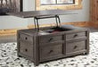 Wyndahl Rustic Brown Coffee Table with Lift Top - Lara Furniture