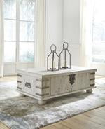 Carynhurst White Wash Gray Coffee Table with Lift Top - Lara Furniture