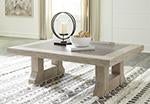 Hennington Light Brown Coffee Table - Lara Furniture